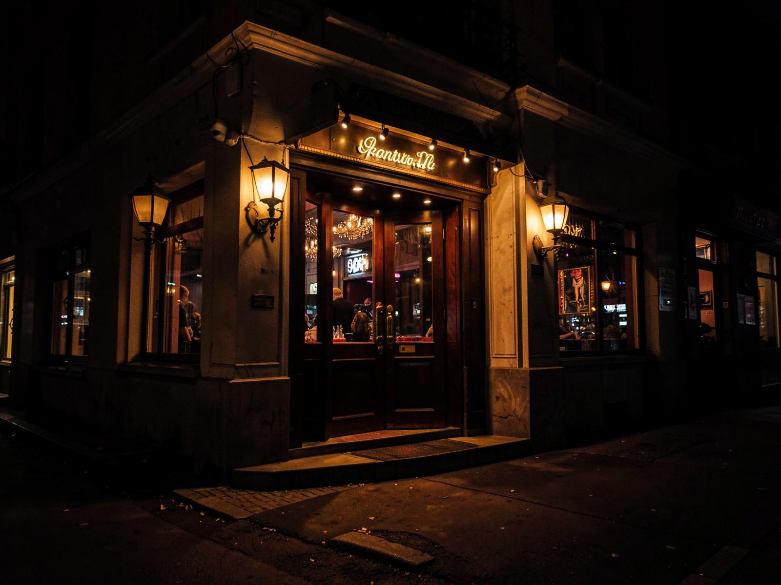 Club Pave entrance glowing at night